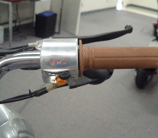 Controller (Right) Front Brake Lever Throttle Parking Lights Head Light When Brake Handle is compressed the rear wheel will slow to a stop and power will be cut off.