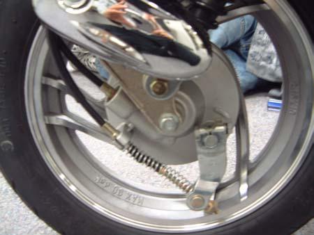 Front Break: Drum Check Squeeze Brake Handle on Right