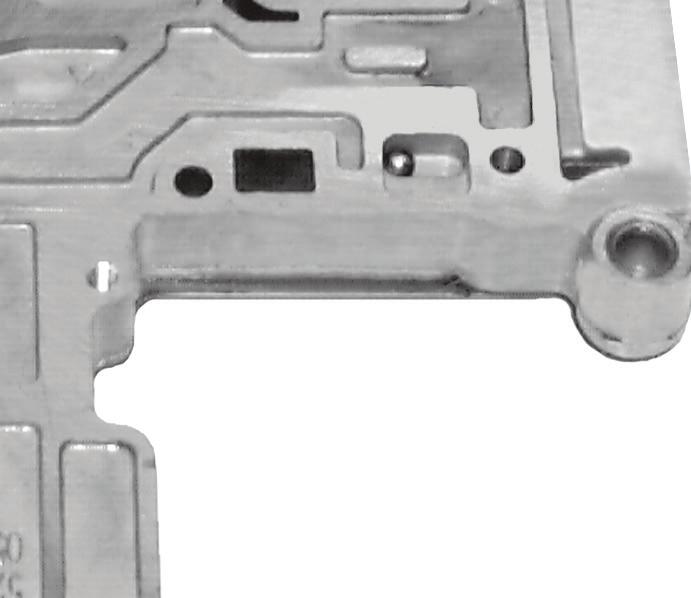 On other side of the channel plate, install two 1/4" checkballs as shown (Figure 10). c. Install six 1/4" checkballs and one 11/32" checkball in the lower valve body locations (Figure 11).