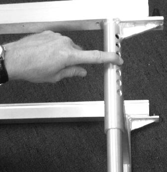 Align the center slot on the clamp to the holes on rolling base leg (Fig. 2). Secure the clamp with bolts.