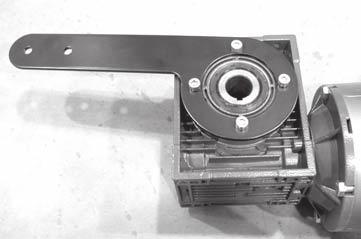 If required, change gearmotor position by removing four (4) screws (Figure 18, item AT). Rotate gearmotor mounting plate to other position and replace screws (AT). Tighten to 200 in-lb (22.5 Nm).
