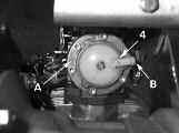 (position A to position B) (FIG. 3 #4). 5. Remove the frame from the engine (FIG. 4). 6.