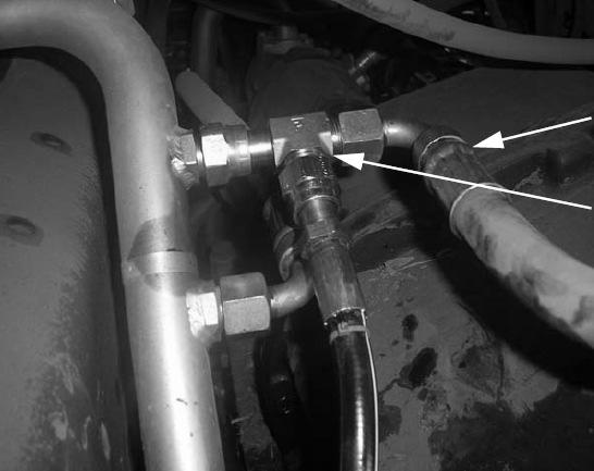 Re-connect the vehicle hose to the end of the Run Tee, and then connect the AutoSteer Tank hose to the side of the Run Tee as shown. 3.