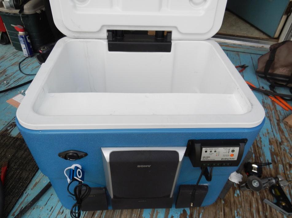 and solar panel controller is provided: 3. Place the battery inside the cooler. 4. Wire the speakers and radio to the amplifier.