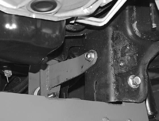 21. Locate the skid plate FT30007 and place tabs around new diff mount on the front crossmember and attach using 12mm x 1.75 x 2.5 bolt, nut and washer.