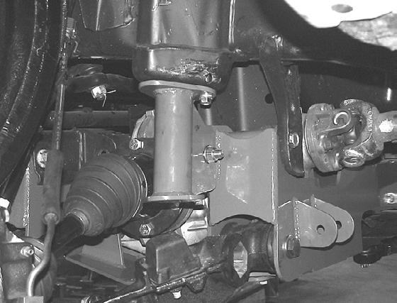 34. Locate the front bump stop bracket FT30004 for the driver side and attach to the crossmember using ½ x 1-1/2 bolt, nut and washers and swing the mount