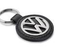 A VW LOGO KEY TAG Metal Volkswagen logo on black leather Diameter: 4 cm Material: Leather,