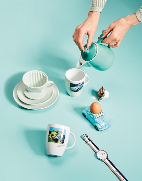 A EGGCUP Meals on wheels: this light blue eggcup in the shape of a Beetle turns even night owls into early birds! With salt shaker in the roof rack Handmade Material: Ceramic 111.
