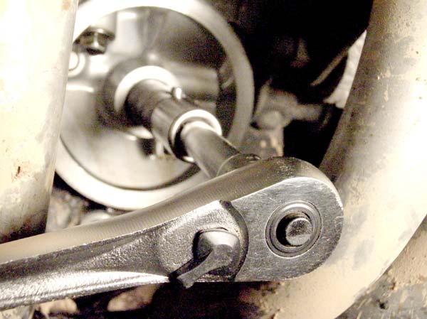 E) Now use the torque wrench with the special tool to tighten the threaded stud into the engine case oil passage