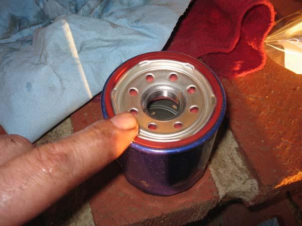 Using a 30mm open wrench or deep socket, tighten the thin nut to 12-16 ft-lbs.