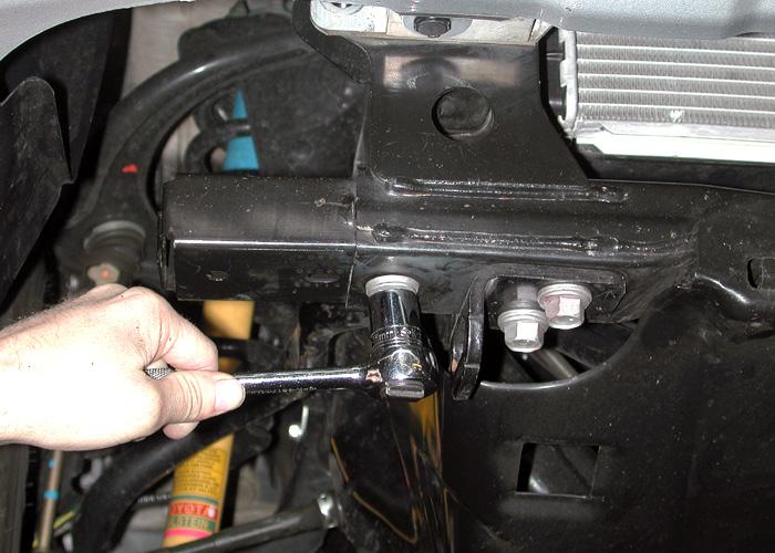 The standard two-wheel drive models do not have a frame cap, and a hole must be drilled in the frame to mount the