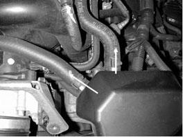 c) Unplug the Mass Air Flow Sensor (MAFS) and pinch the rivet to release the wiring harness.