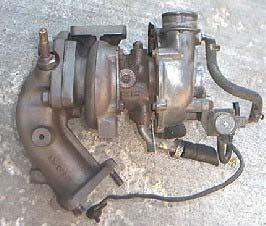 It has a circular inlet flange, and wastegate that is set at 8psi.