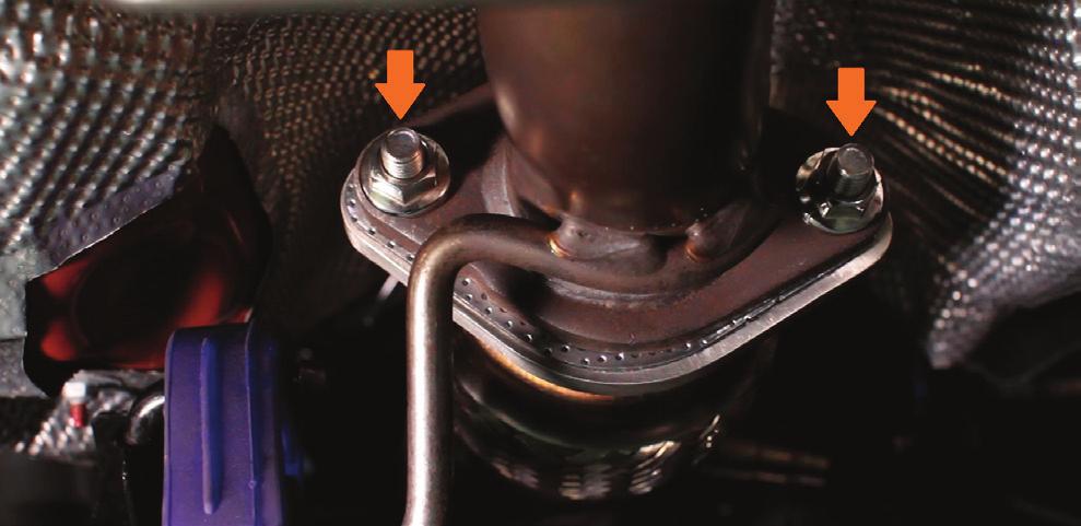 11. Remove the two nuts that secure the front of the exhaust system to the downpipe. (2x 15mm nuts) 12.