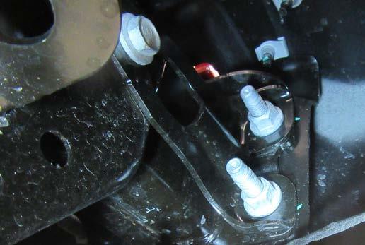 4. Using a 10MM socket remove the one (1) bolt on