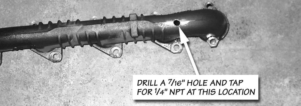 Figure 2: Location to drill and tap the driver side exhaust manifold for the thermocouple 7. Remove all metal chips from the exhaust manifold.