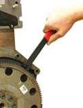Used to hold the pulley in position while loosening or tightening the central fixing screw.