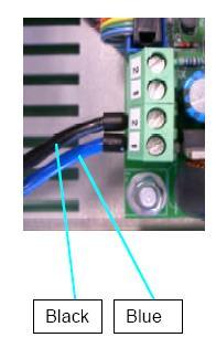 A: Maintenance 6. Reattach the two cables of the Halogen lamp module to the cable-clamp. To do this, attach the Halogen lamp s blue cable to Port 1 and the black cable to Port 2 of the connector.