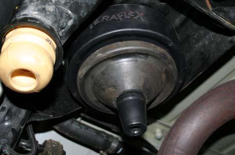 Use the factory bolt on the axle side with the nut on the outside so excess threads will not interfere with the shock.