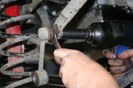 24. Remove sway bar links using 18mm socket and wrench at the
