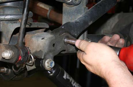 Lift one or two inches so that it is easy to remove the bolts from the shocks and sway bar links.