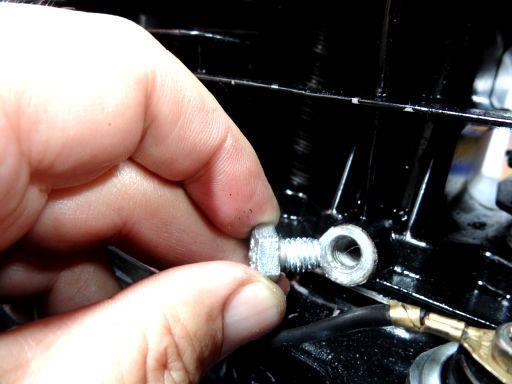 Install the short blanking plug bolt into the bottom hole in the centre rear of the cylinder barrels.