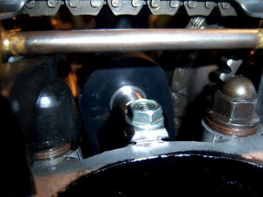 IMPORTANT: Be sure you have orientated the top cross bar so the widest of the two flats on the pin are facing DOWN and sitting on the top of the cylinder head surface as shown.