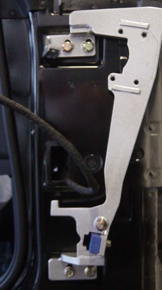 3.) Mount the LSD ground plate (R) to the original hinge mounting holes /points on the