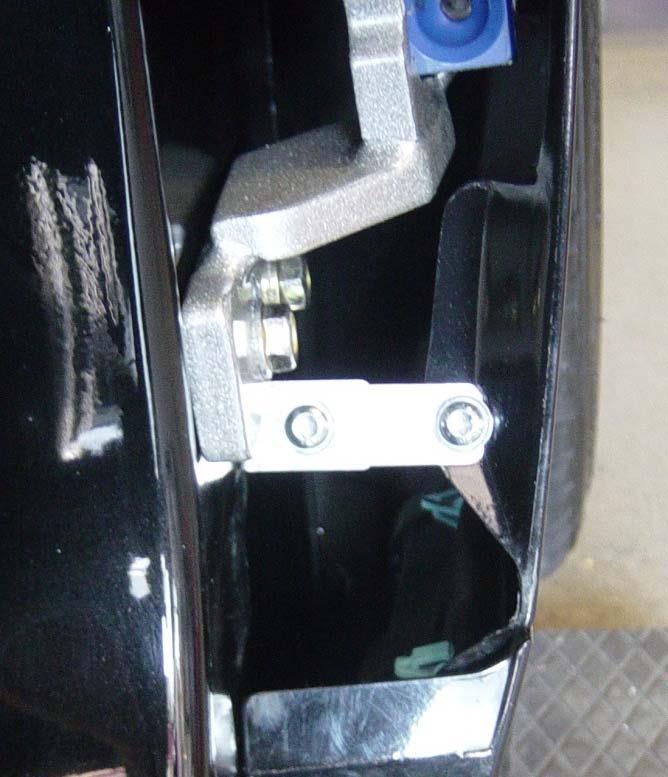 21.) After that install the fender holder.