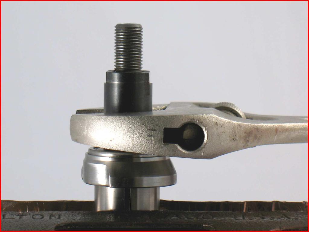 6. Fasten the 01120 Rotor in the vise with aluminum or