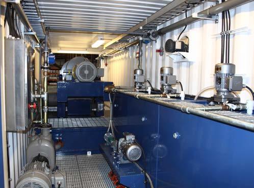 Packaged Dewatering Systems Centrifuge Technology Integrated with Polymer Injection 20 Foot Containerized Dewatering System Built inside a 20 container featuring the ESS-1450HD2 decanter centrifuge.