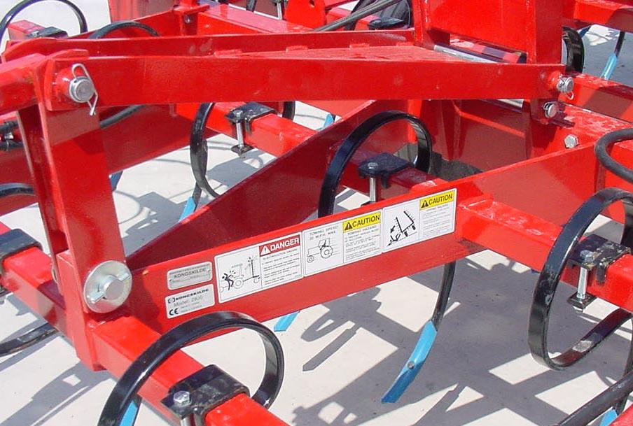 5) The 3 safety decals #600475170, 600475169 & 600475160 are located on the front frame side bar beside the serial