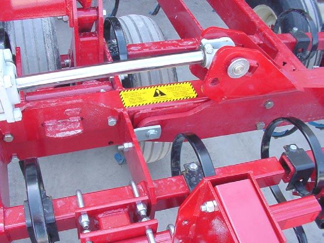 ELECTROCUTION DANGER TOWING SAFETY TIPPING HAZARD SERIAL # PLATE CE Label 6) Install the Wing Fold Lock Warning decals