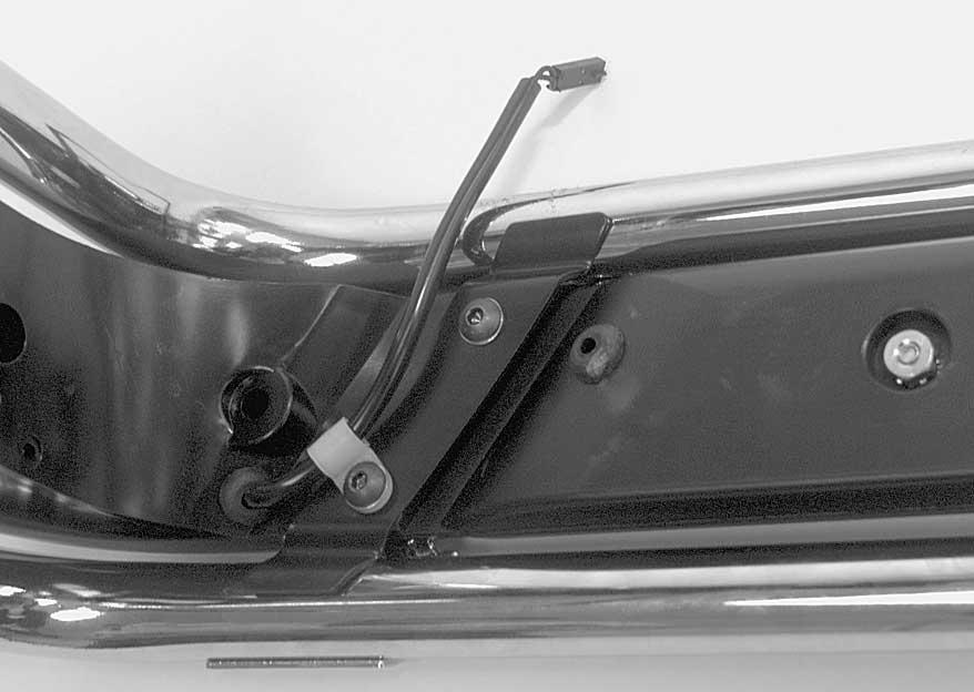 Rear to Side Light Bar Connection. See Figure. Remove TORX head screws holding guard rails to saddlebag support assembly.