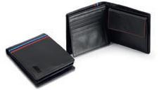 Black 80 23 2 147 074 M WALLET. Made of black cowskin in classic design. With leather stripe in BMW M colours. Engraved BMW M logo on front.