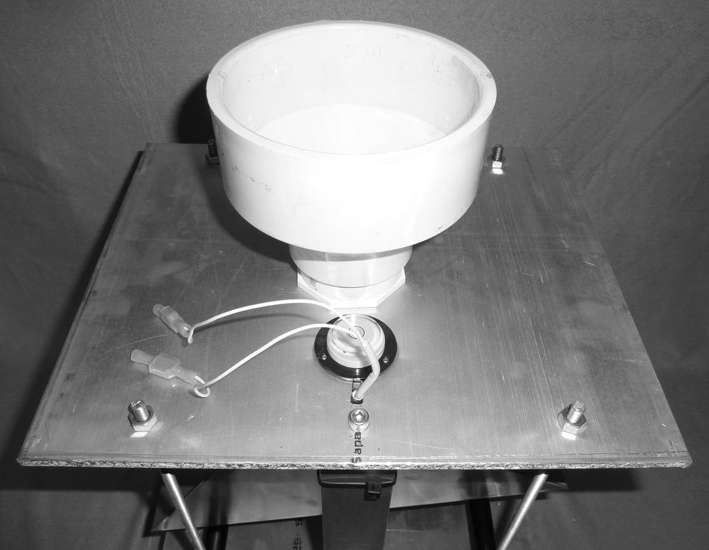 Collec/on&funnel& Top&plate& Bubble&level& Figure 7. Proper bubble level placement for leveling tipping bucket assembly.