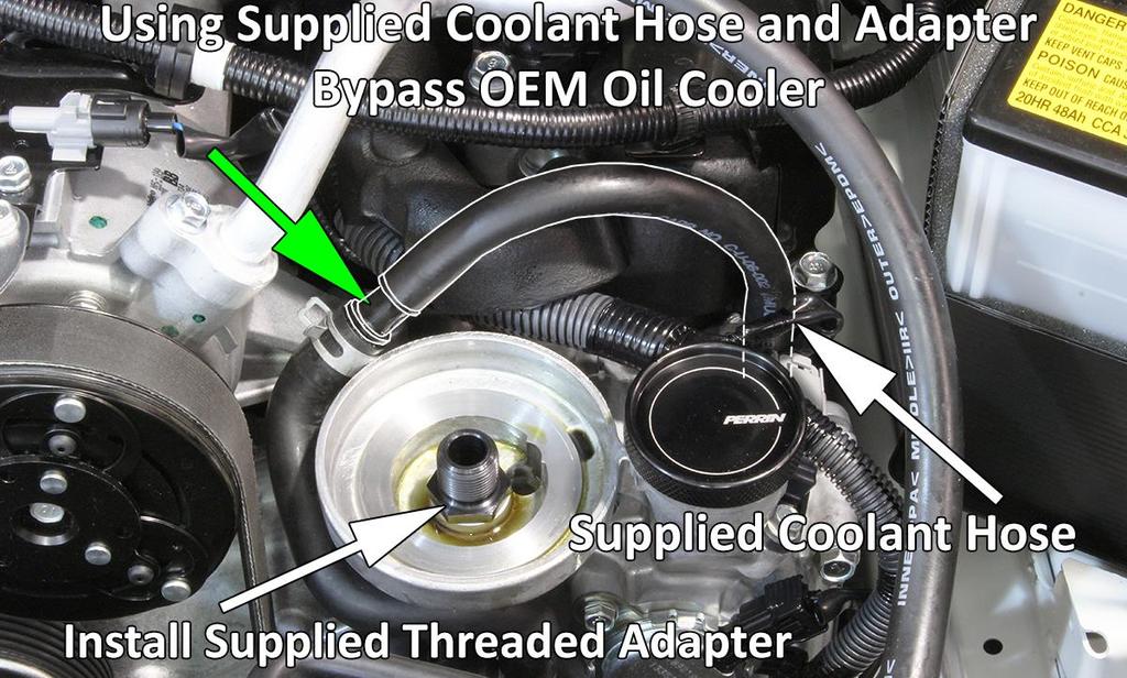 Secure with OEM pinch clamps. f. Trim 3/8 Coolant hose to length and connect to plastic 1/2-3/8 connector.