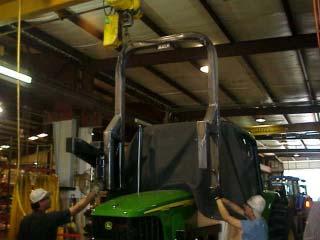 Pre-Installing High Frame: (continued) Frame Rail Installation 4. Lower High frame down over Tractor.