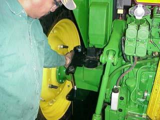 Use a Hoist to install Frame rails to Tractor. (See Figure 1). 2. Install the Bolts into the rear Axle Housing to support the rear of the frame rails. This is the same for LH & RH.