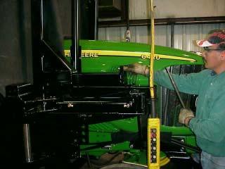 Frame Rail Installation 4 WD Re-Install High Frame to Tractor: (continued) 5. Install Mounting Tube Bolts.
