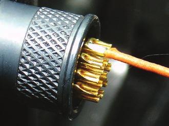 Place the iron tip inside the bucket and slide in the wire to be terminated. Always clean solder joints, ensuring that the contacts are not damaged.