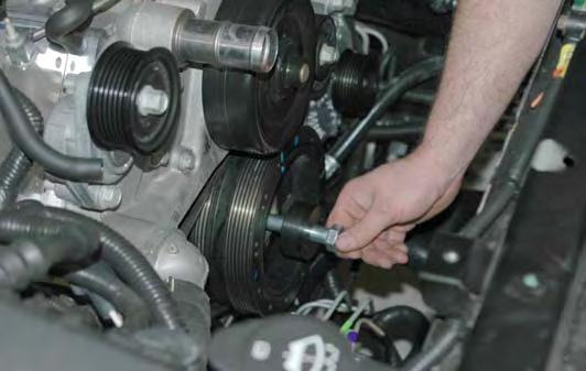 85. Remove the stock balancer bolt from the end of the crankshaft with an impact gun and a 24mm socket.