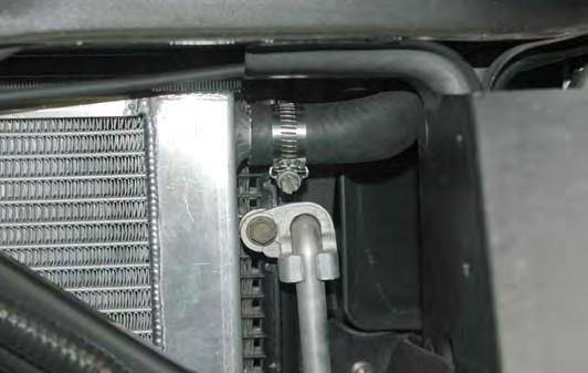 Route the large L hose through the area created by removing the air box boot.