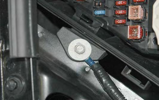 Connect the Black ground (-) wire with the ring terminal to the forward bolt that secure the fuse/ Relay center to