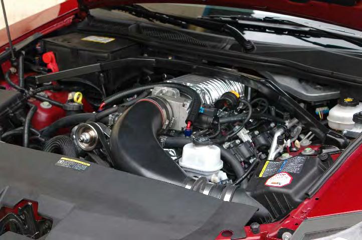 Re-attach the intercooler hose to the manifold and tighten the clamp securely. 227. Start the vehicle for 5 seconds and shut off, once again check for fuel leaks and supercharger belt alignment.