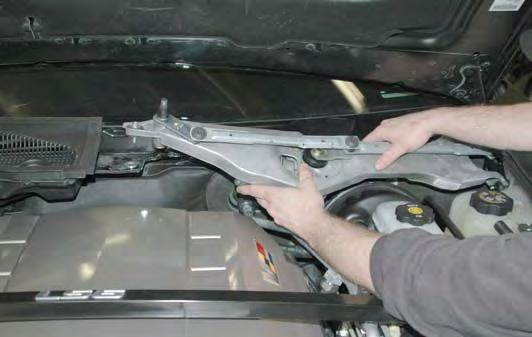 Install the thick spacer washer supplied over the wiper assembly