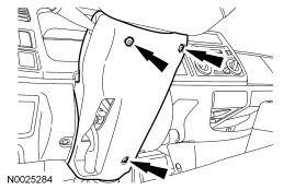 For additional information, refer to Steering Wheel in this section. 2. Tilt the cab forward. 3.
