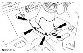 Disconnect the steering shaft from the steering gear. 4. Lower the cab. 5.