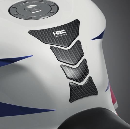 TANK PAD 08P61-MFJ-100A Made of real carbon fibre. Features the Honda Racing logo. Glossy UV-resistant top coat for a custom look.