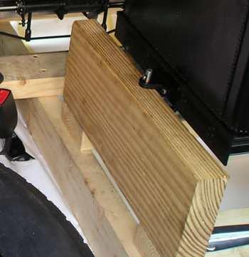 The tender track has a 2X6 front support fastened to the tracks by shelf brackets.